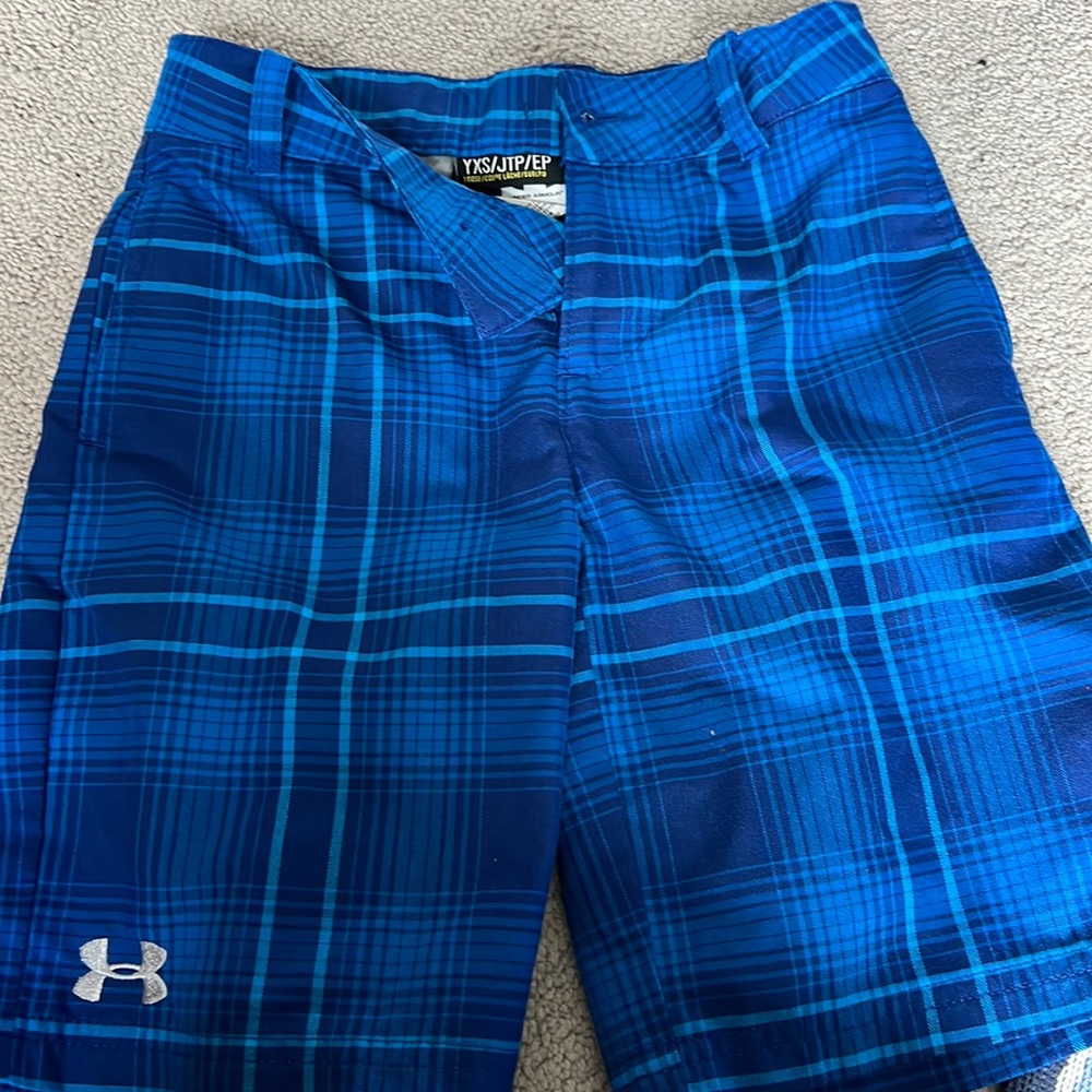 UA boys golf shorts